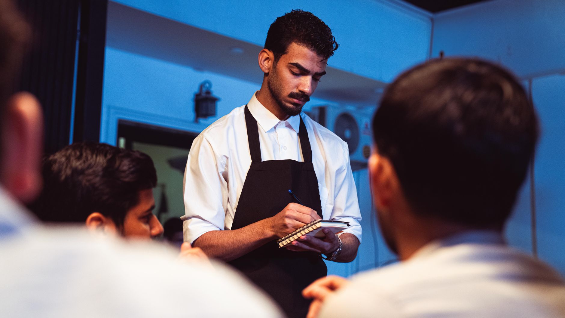 Happy guests enjoying a positive dining experience at a restaurant