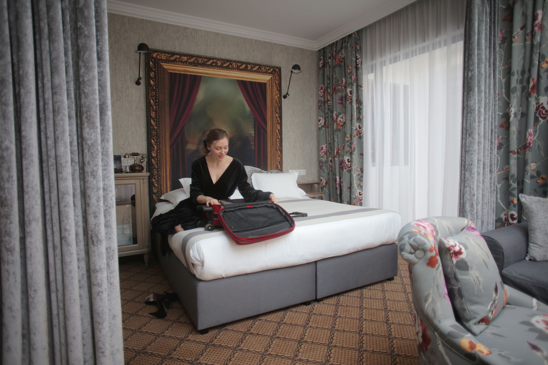 Guest reviewing the amenities in their hotel room, a scenario evaluated by mystery guest