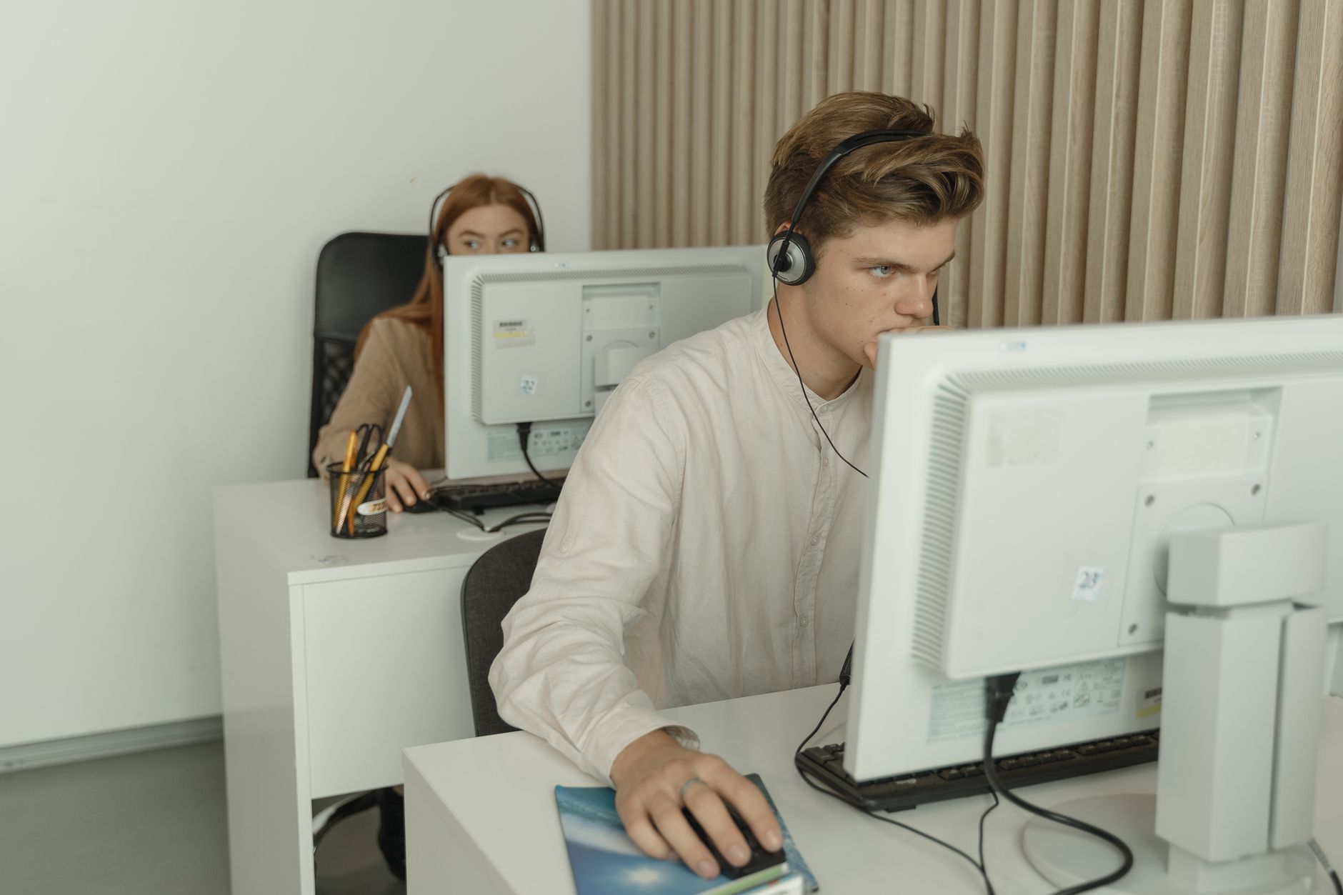 Sales team using a CRM platform in the office