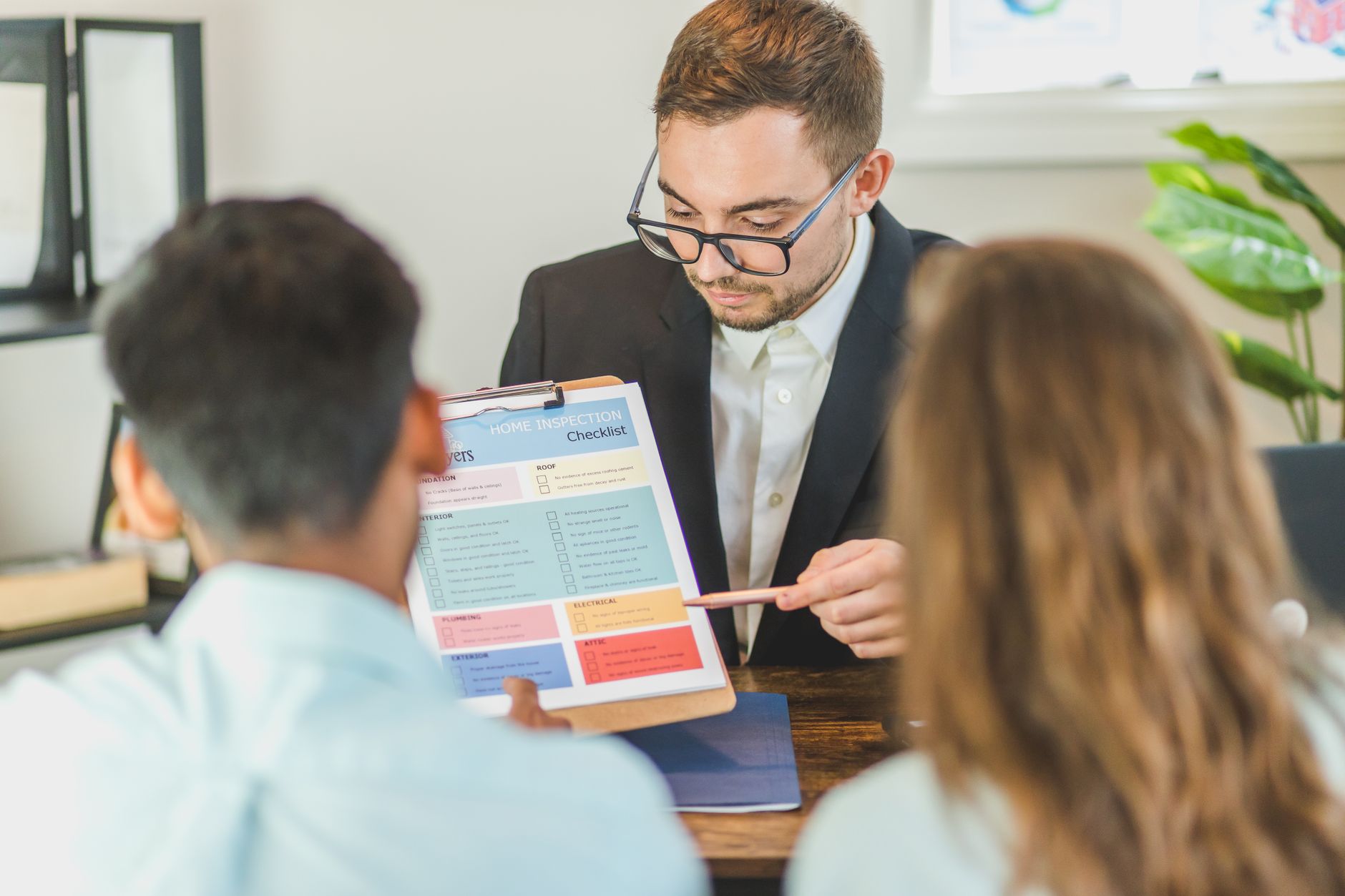 Business team reviewing a customer service checklist in a meeting